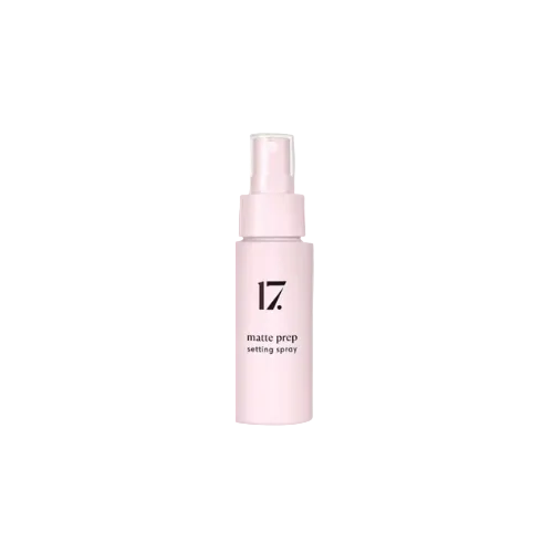 A bottle of 17 Matte Prep Setting Spray with a white label on a plain background.