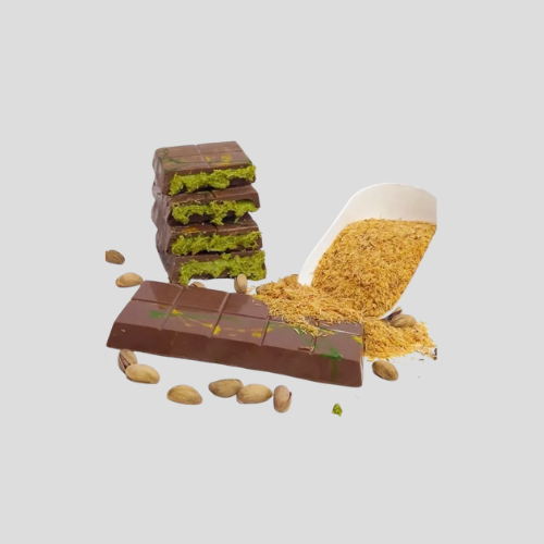 Luxurious box of Dubai chocolates with gold wrappers on wooden table – premium Middle Eastern sweets available online in the UK at IndianGroceryUK