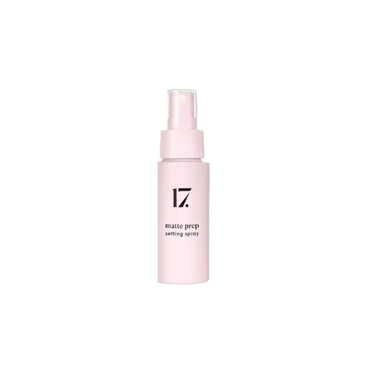 A bottle of 17 Matte Prep Setting Spray with a white label on a plain background.