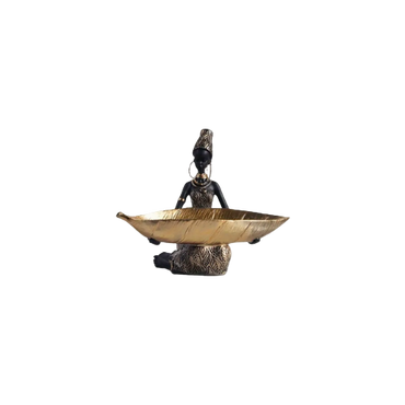 Elegant black and gold woman sculpture with intricate patterns – living room ornament